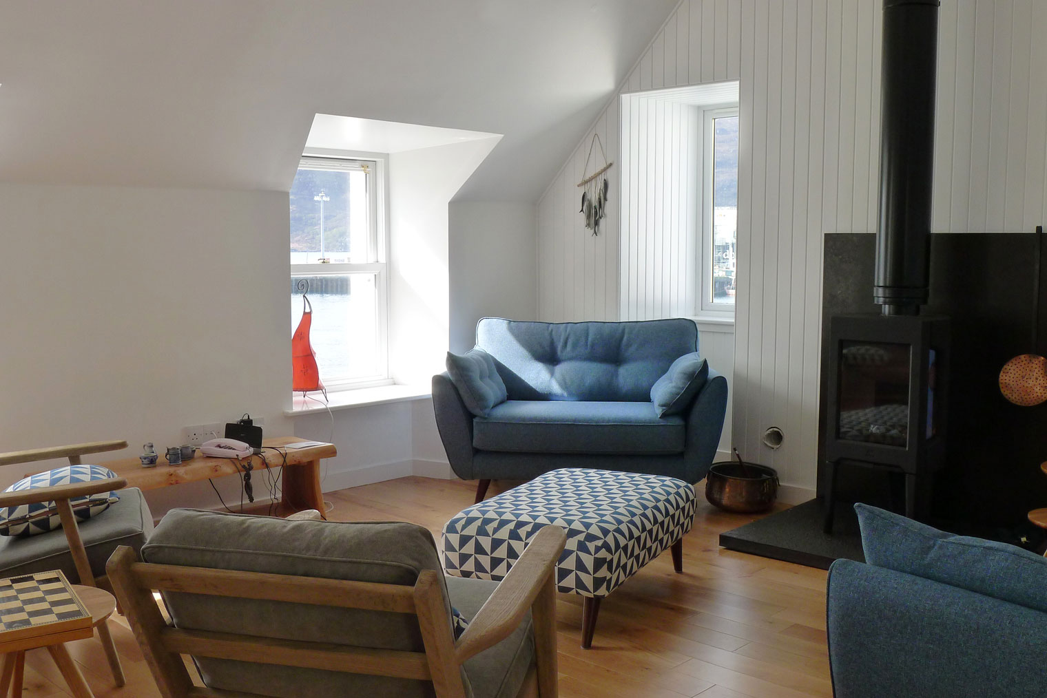 Bright, spacious living room with sea views