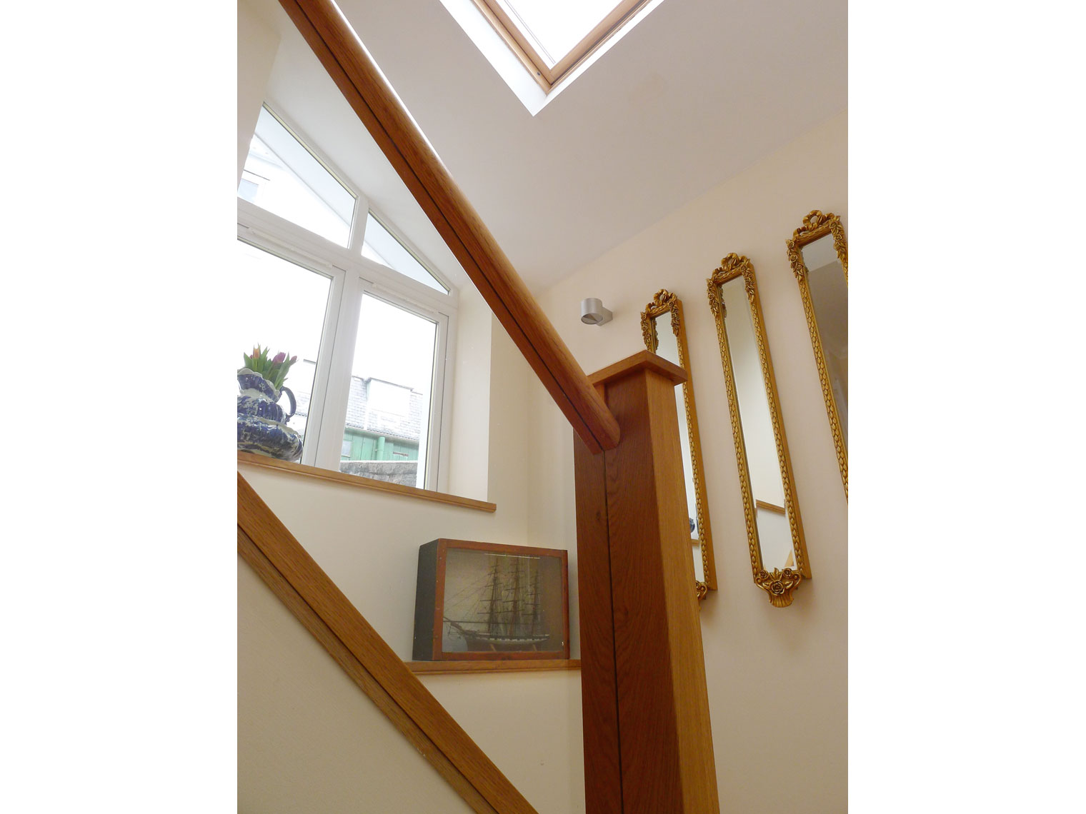 Vaulted stairway to living room