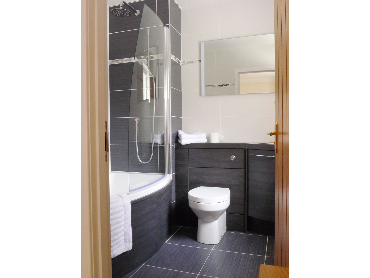 En-suite bathroom with full bath and shower